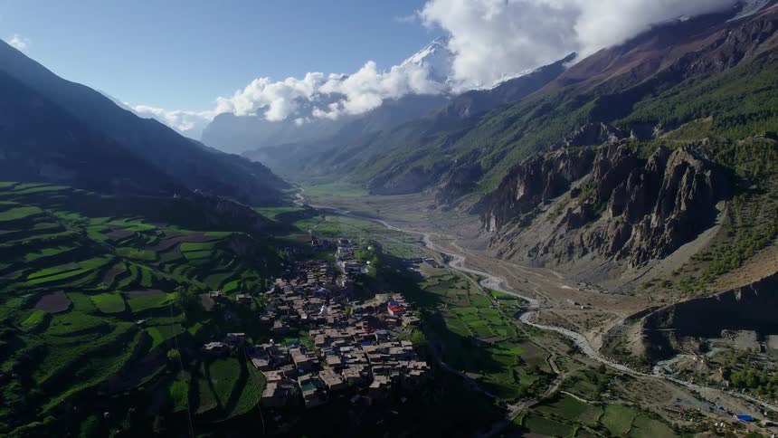 A small town surrounded by mountains