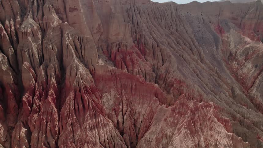 Aerial of pink mountains in the desert