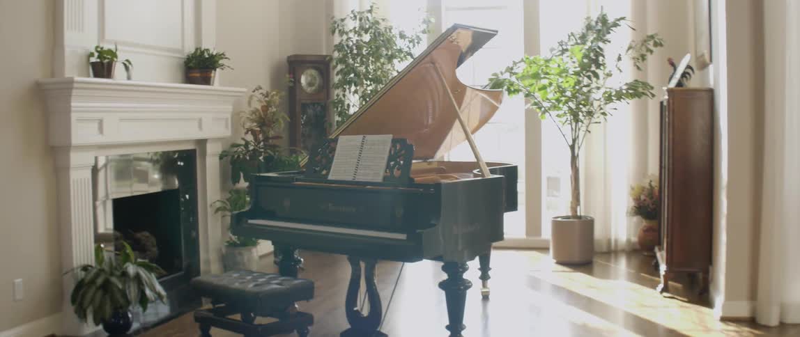 Piano sitting in a very nice room