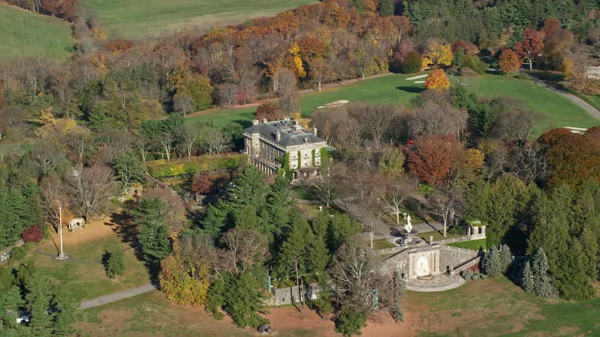 An aerial view of a castle in a rural community