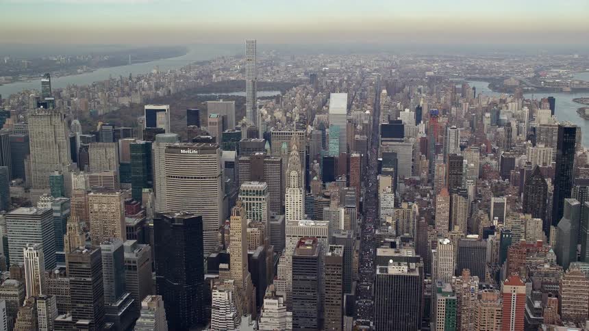 Aerial view of skyscrapers by the seaside in a metropolis