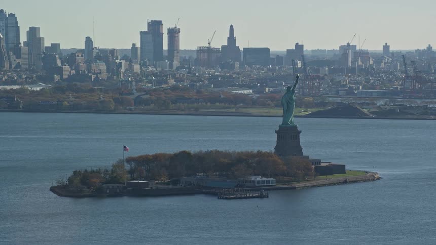 An aerial view of the statue of liberty on an island
