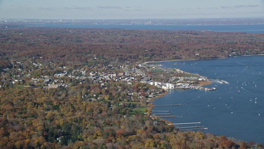 Aerial panorama of an urban city facing the sea