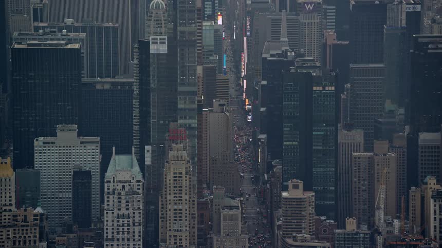 Aerial architecture of illuminated skyscrapers in a metropolis