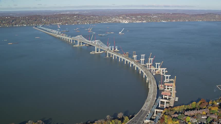 Traffic crossing bay parallels second causeway under construction during the fall