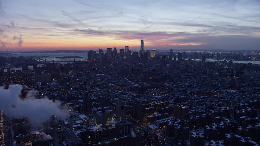 A city during winter comes to live as the sun rises
