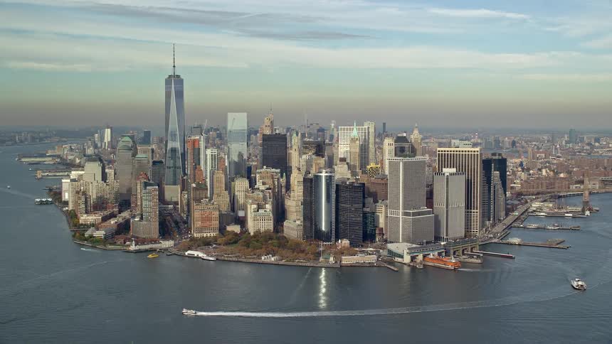 A city view near the shore with boats