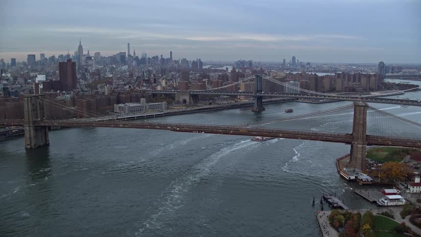 Aerial panorama of a bridge above the sea connecting the metropolises