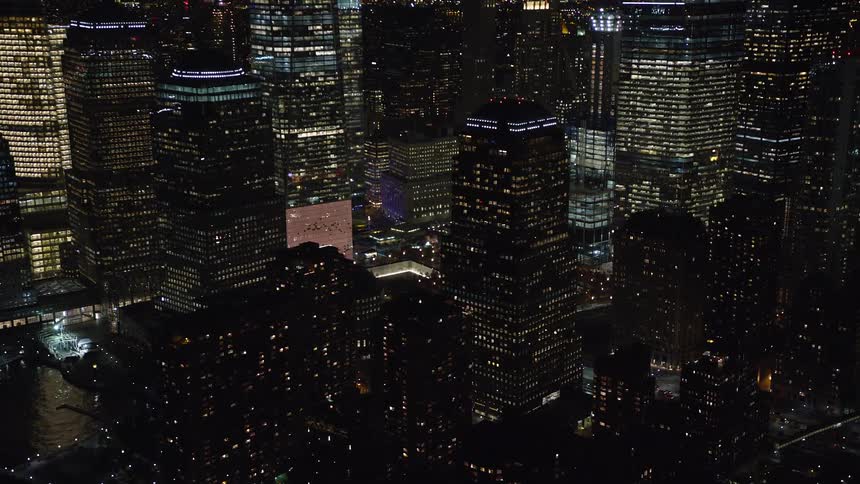Skyscraper architecture with aerial and nighttime view of a metropolis by the sea