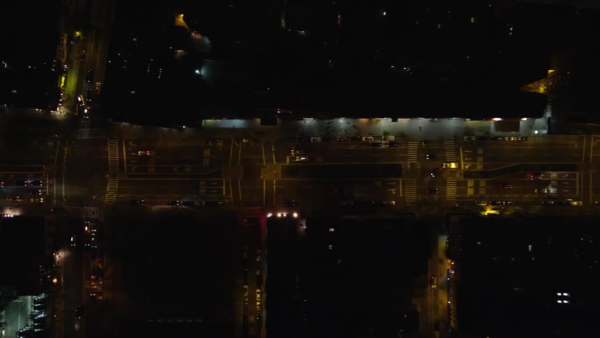 Aerial view of highways amidst a metropolitan city