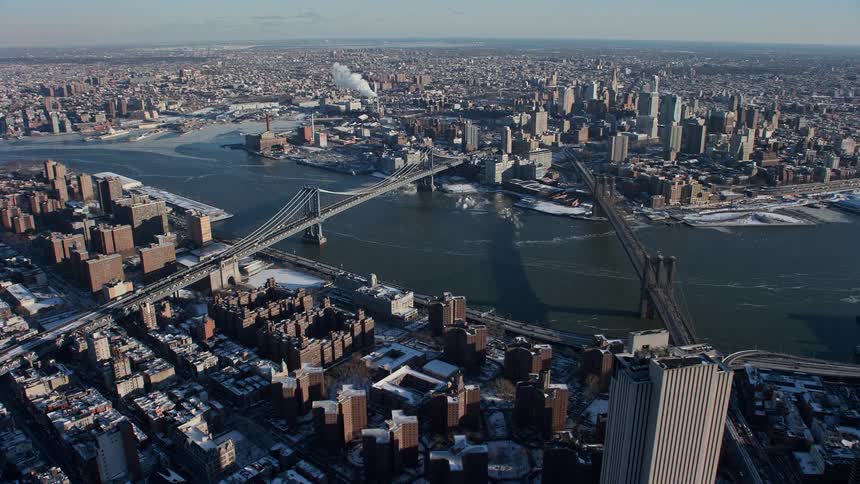 Skyline of buildings and bridges in a metropolitan area during the day