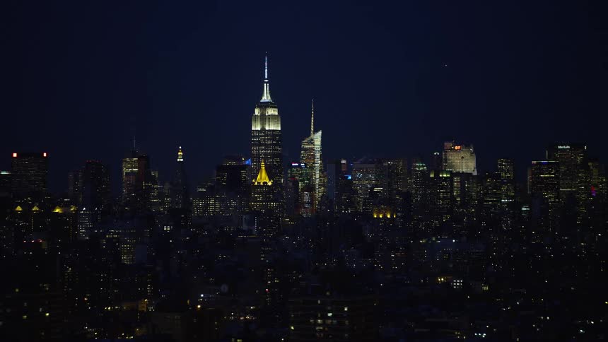 City skyline of a metropolitan area at night