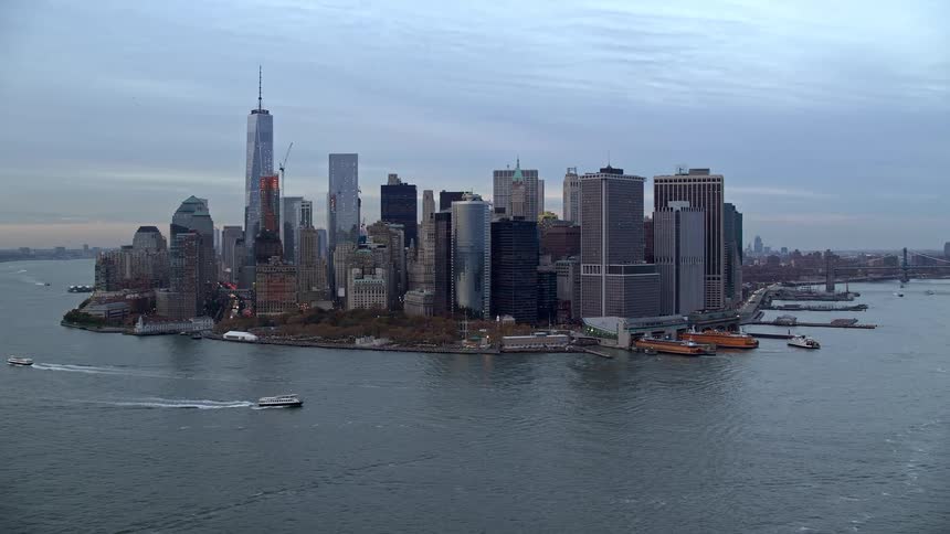 A metropolitan city with several buildings facing the sea