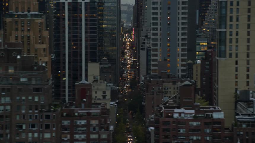 View of a metropolis with skyscrapers and highways crowded with traffic