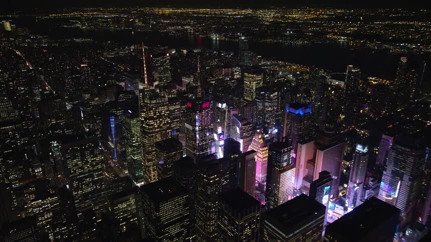 Aerial of time square illuminated at night