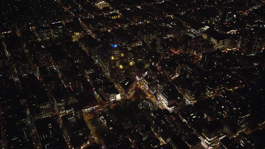 A night aerial view of a suburb in a metropolis