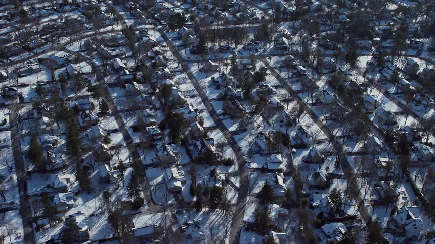 The suburbs are covered in snow