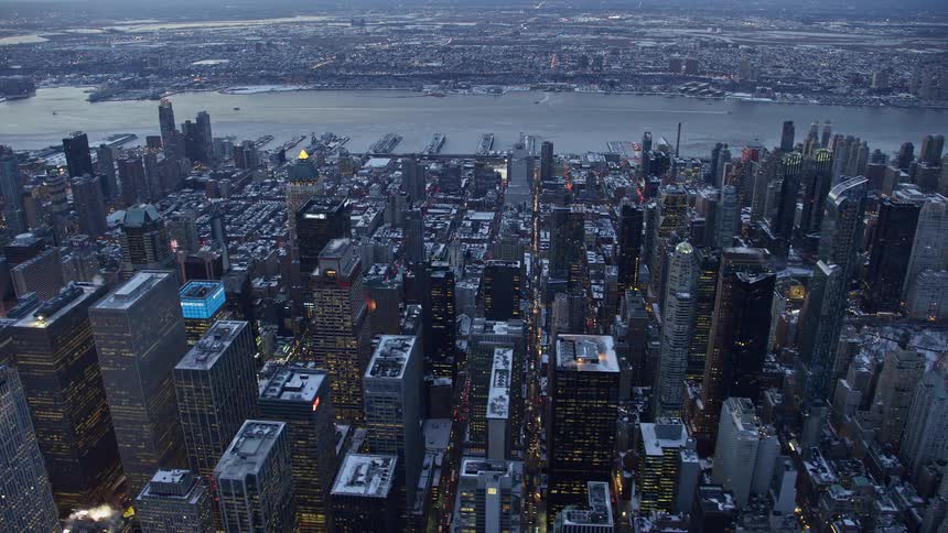 Aerial view of a metropolis by the seaside with skyscrapers in winter