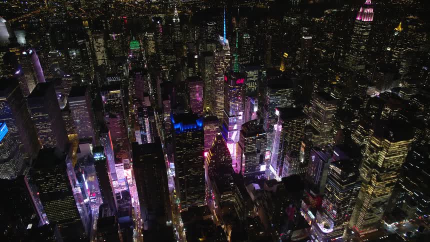 Aerial architecture of illuminated skyscrapers in a metropolis at night
