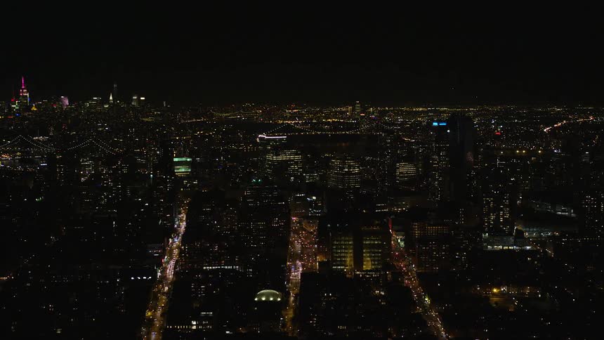 Aerial view of a metropolitan city at night