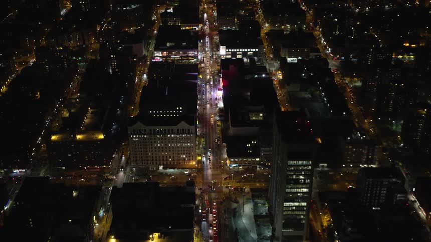 The city is brightly lit at night