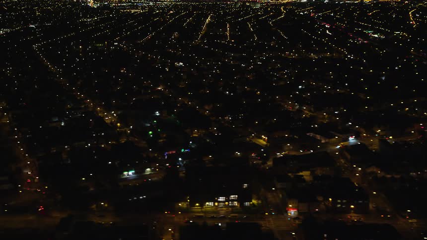 Skyline of an illuminated neighborhood at night