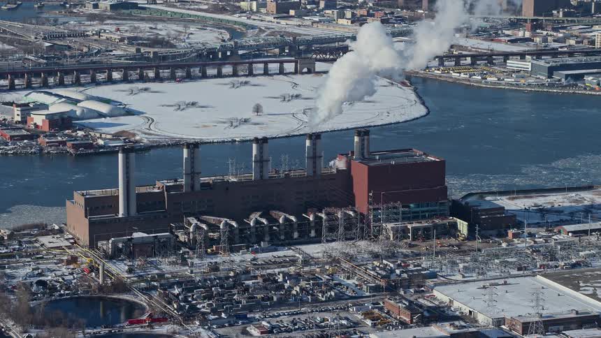 Aerial view of a factory by the seaside in winter