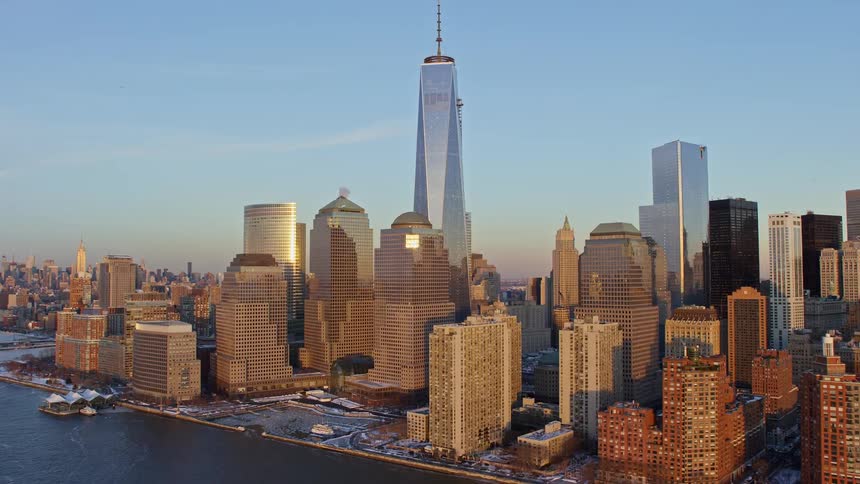 Aerial panorama of towers and skyscrapers in a seaside metropolis on a winter morning
