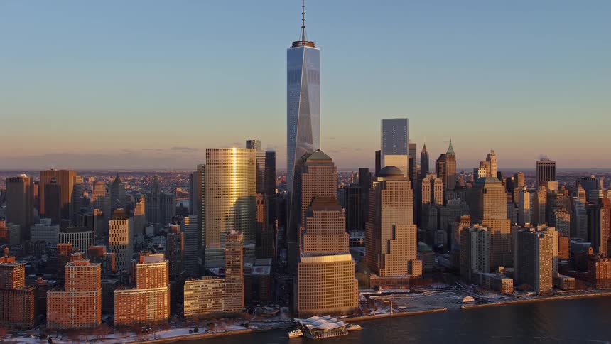 A helicopter flies over the city