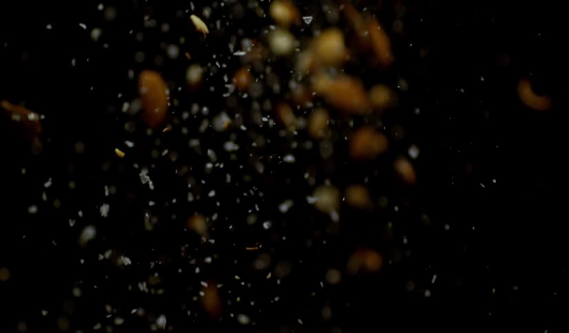 Crumbled almonds slowly fall