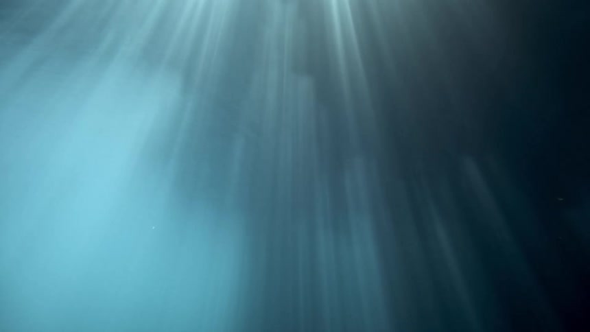 View from inside the sea with sunlight reflection
