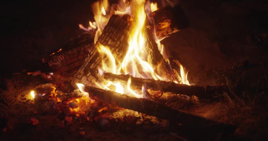 Small campfire lit at night