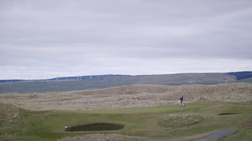 Man walking on a golf course