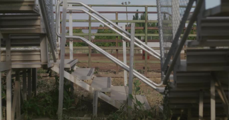 View of stairs and bleachers in a rodeo arena