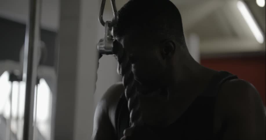 Man using exercise equipment