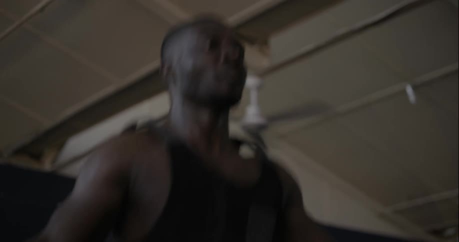 A man is jumping rope fast