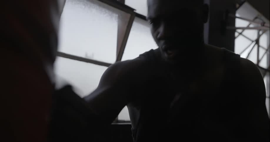 Man punches a punching bag
