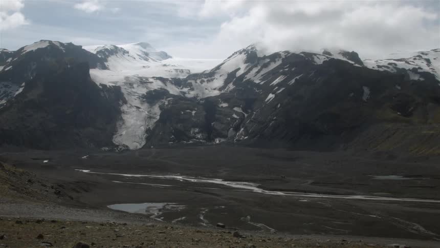 The mountains in the distance are covered with snow