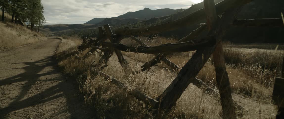 A trail runs by the mountain range