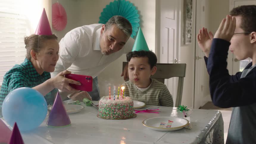 A clip of a family celebratingbirthday