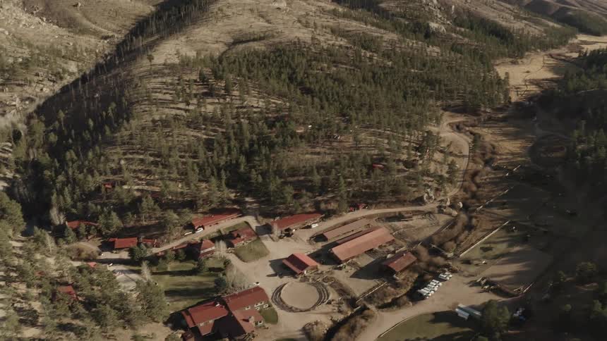 An aerial view of a village amidst nature