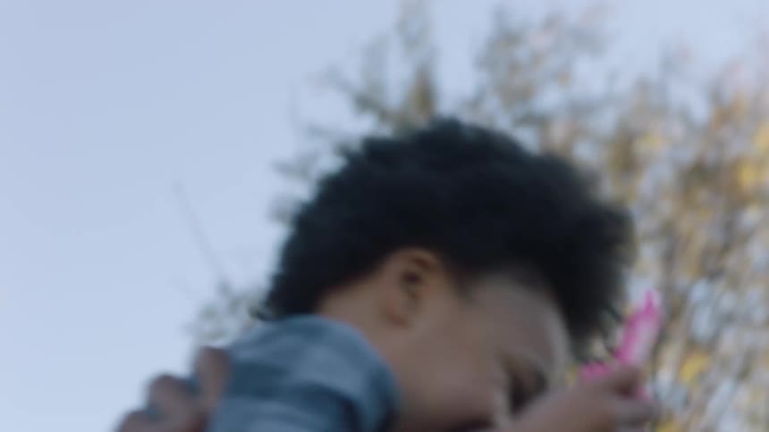 Father lifting his son and playing with him