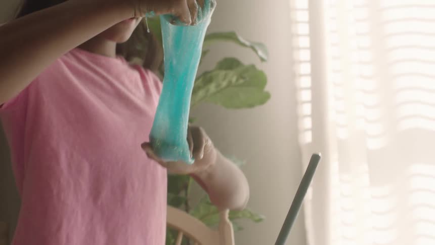 A clip of two female kids experimenting
