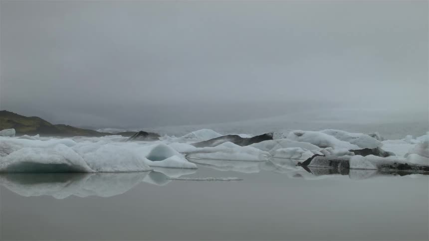 The shore is surrounded by ice