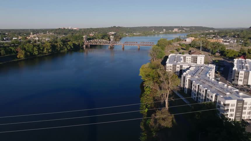 Landscape of buildings waterways and bridge in a metropolitan area during the day