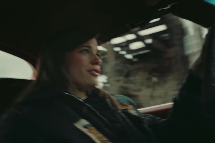 Portrait of a woman driving a vehicle