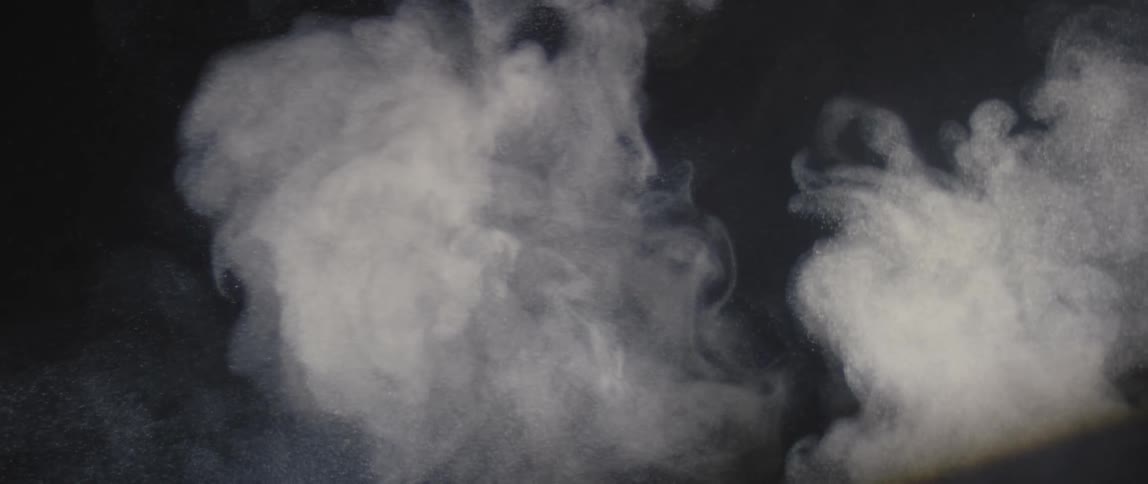 White powder and smoke in abstract slow motion
