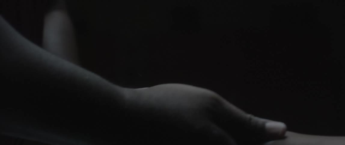 Closeup of two hands one applying magnesium to the palms of the other