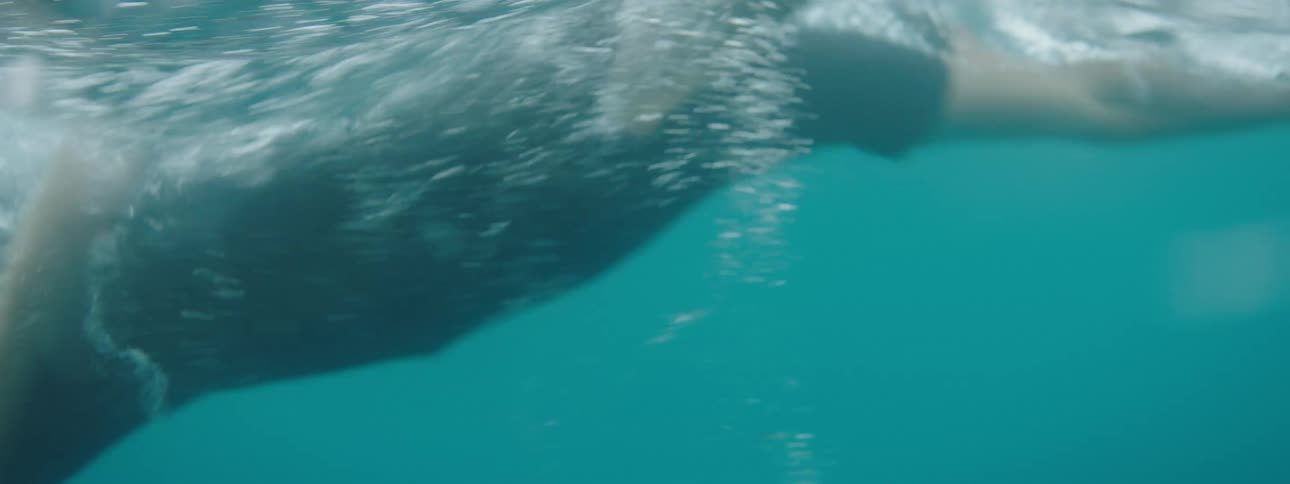 Man swimming at high speed