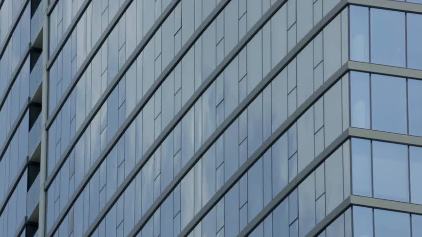 The windows on this tall building are reflective